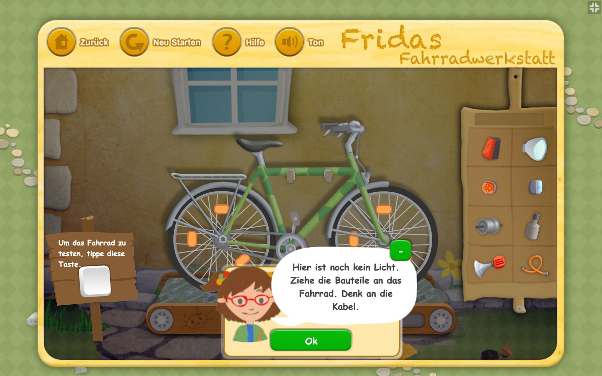 Screenshot der Lernapp: Frida fordert auf, Lichtteile ans Fahrrad zu ziehen